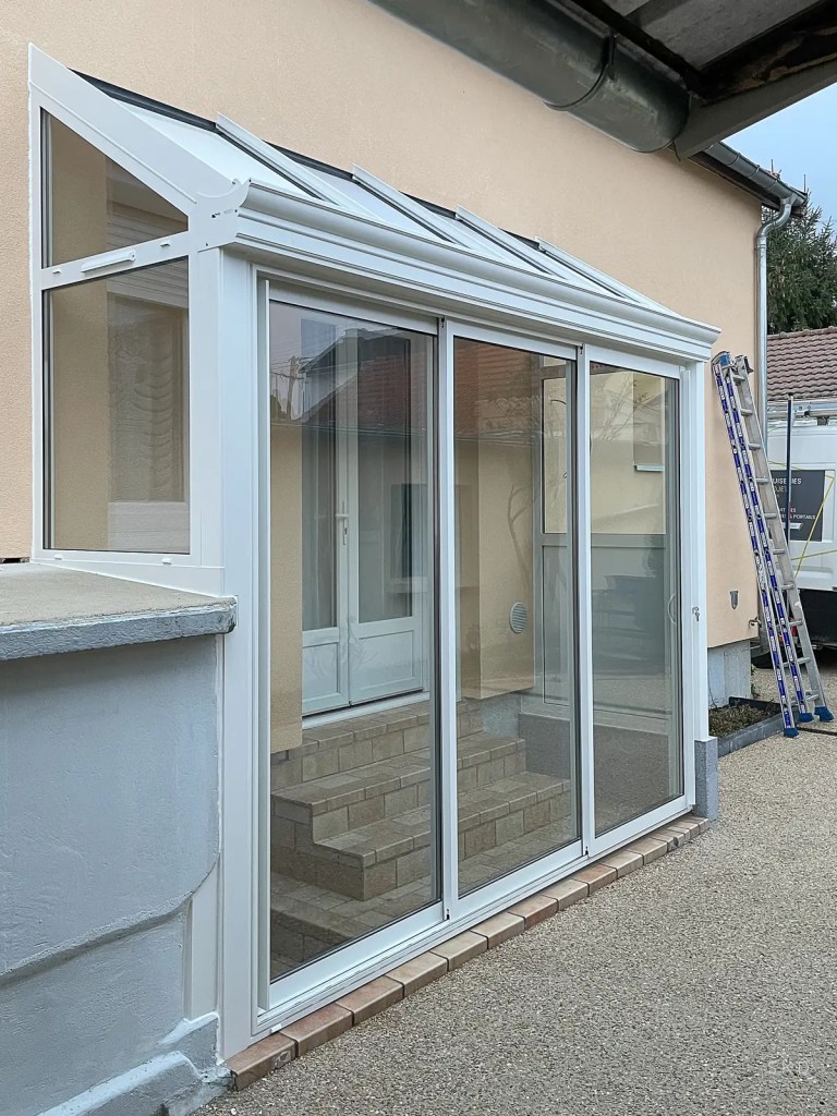 Véranda aluminium blanche dans la Marne